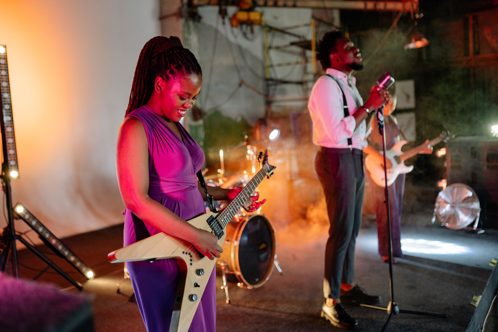 A band playing live in a small room