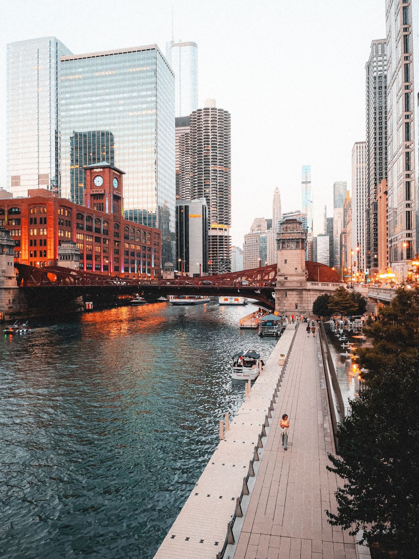 The Chicago Riverwalk and LaSalle Street bridge with the Reid Murdoch Building clock tower